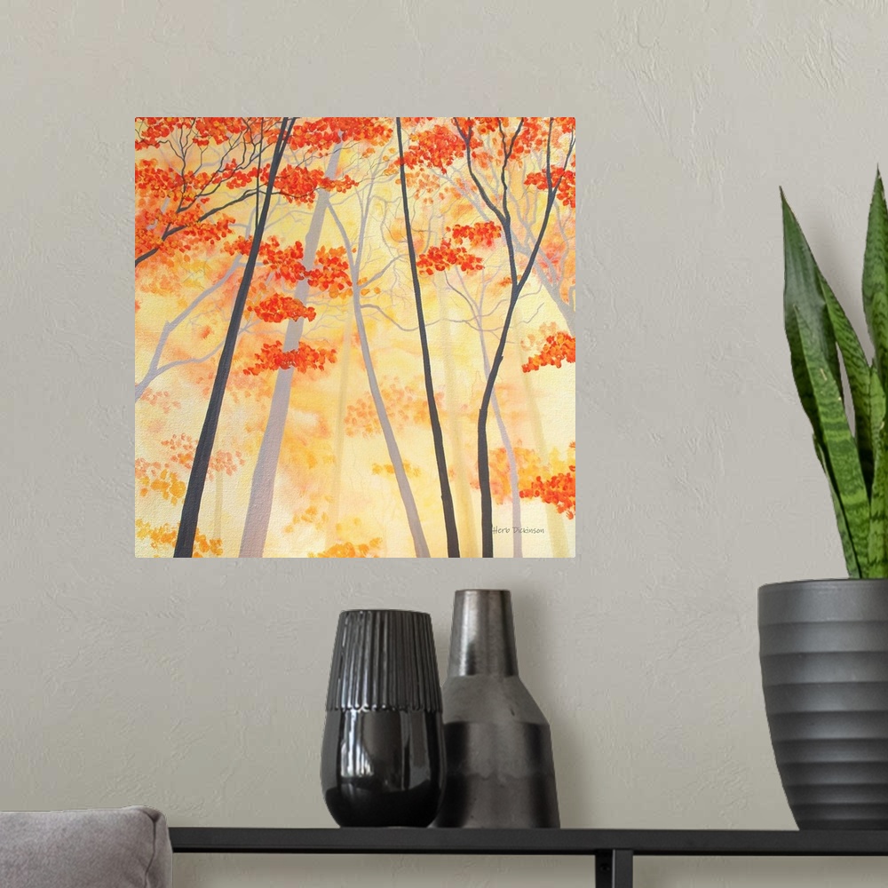 A modern room featuring Square painting of Autumn trees with orange and yellow leaves.