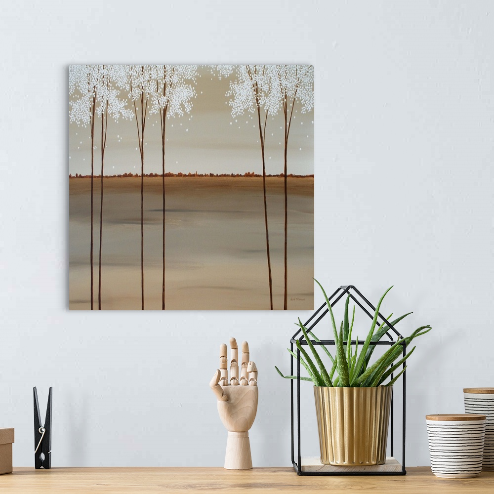 A bohemian room featuring Minimalist square painting of tall Spring trees with white blossoms.