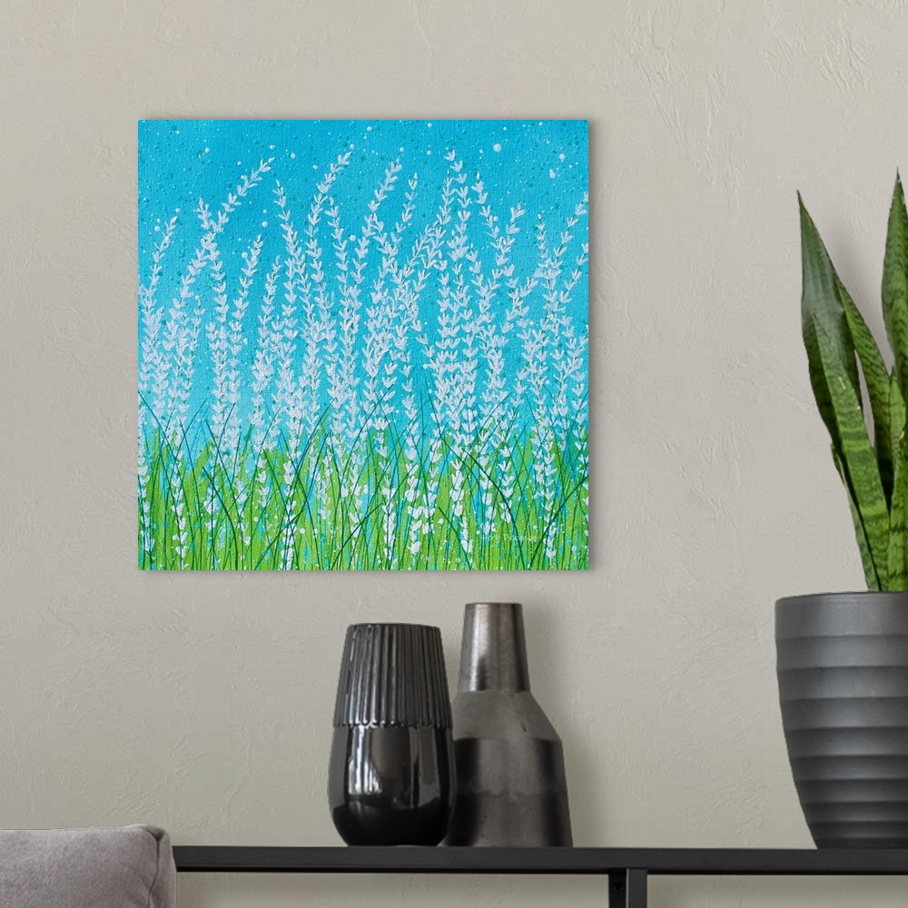 A modern room featuring Square painting of a Spring landscape with tall white flowers and green blades of grass on a brig...