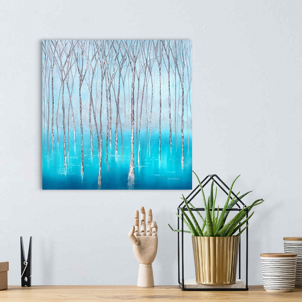 A bohemian room featuring Bare Winter trees in beautiful blue waters on a square background.