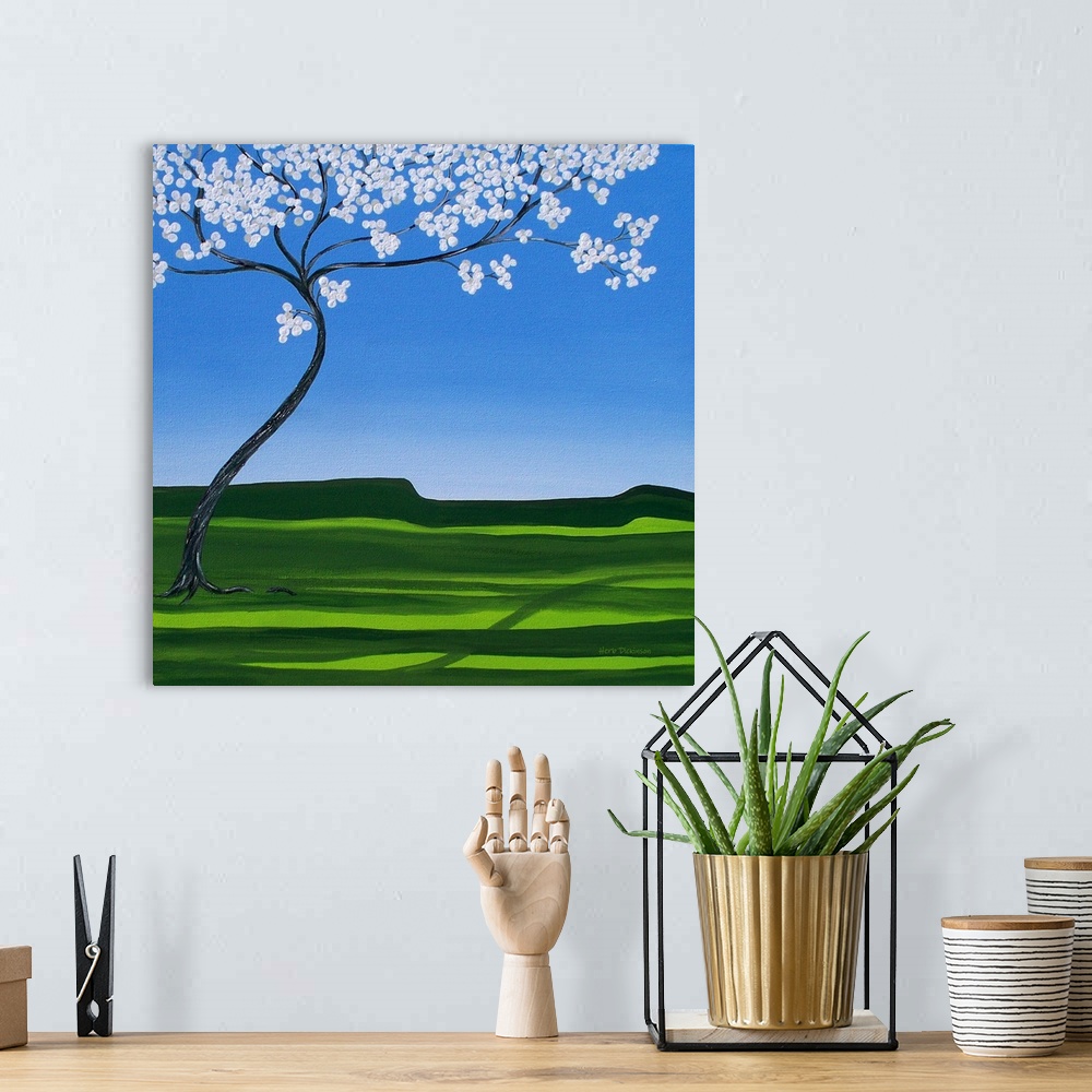 A bohemian room featuring Winding Spring tree with white blossoms in a blue and green landscape setting and a square backgr...