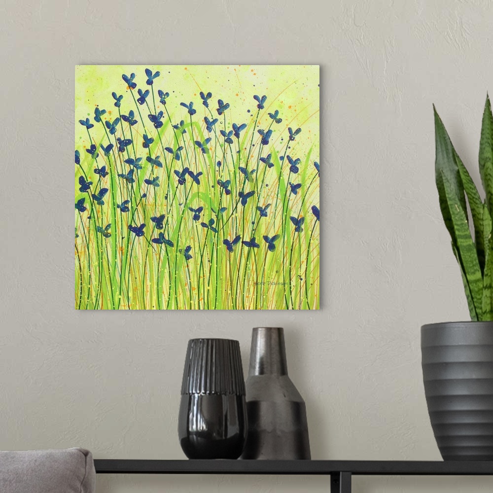 A modern room featuring Blue wildflowers with green stems and orange and green grass on a light green paint splattered ba...