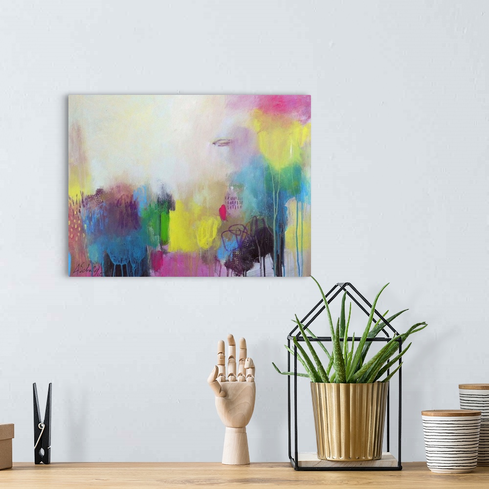 A bohemian room featuring A contemporary abstract painting using a mixture of vibrant colors.