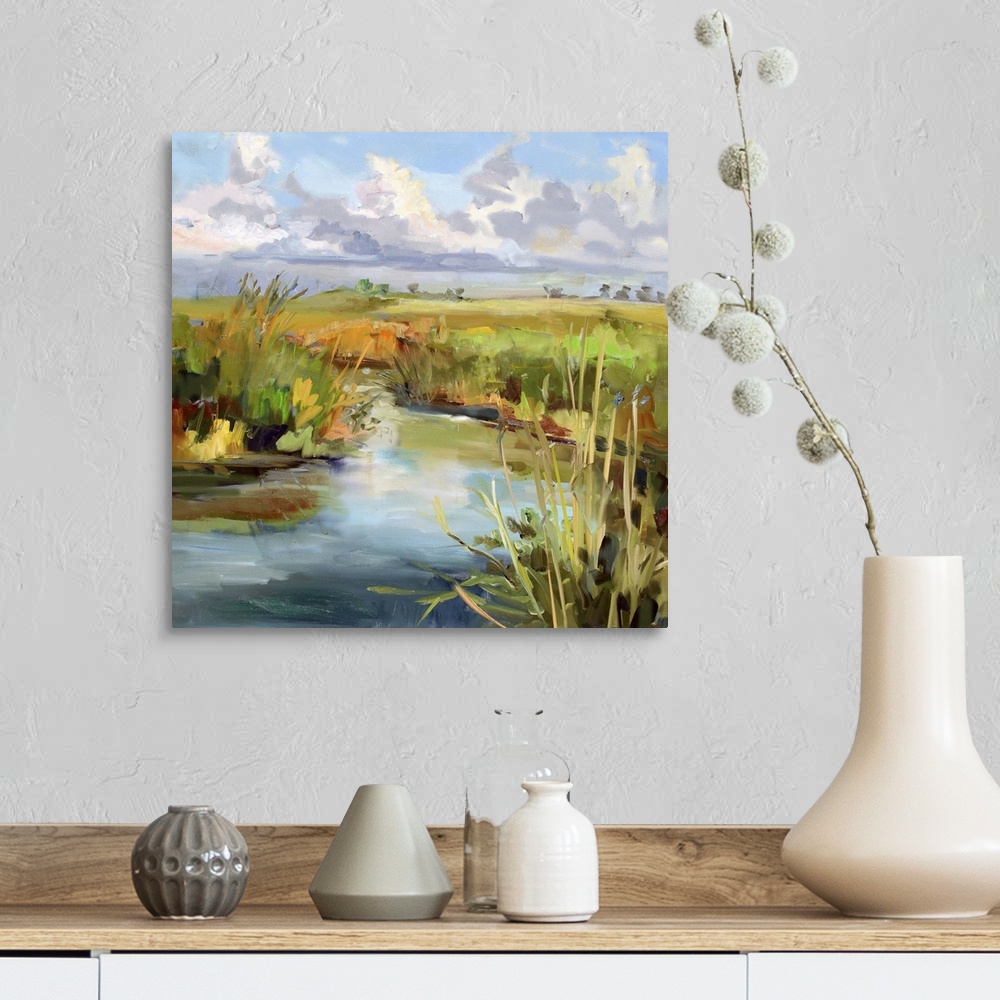 A farmhouse room featuring A contemporary painting of a marshland under a blue sky.