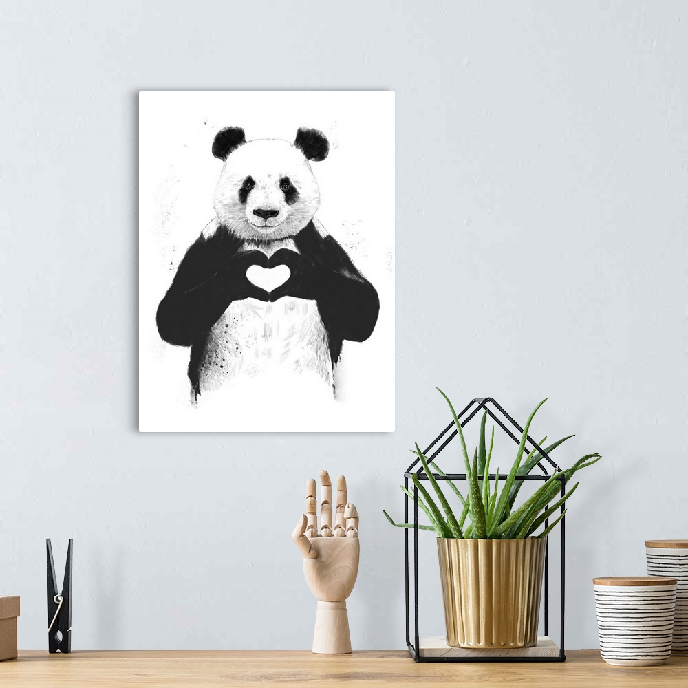 A bohemian room featuring A contemporary illustration of a panda bear holding up paws to make a heart shape.