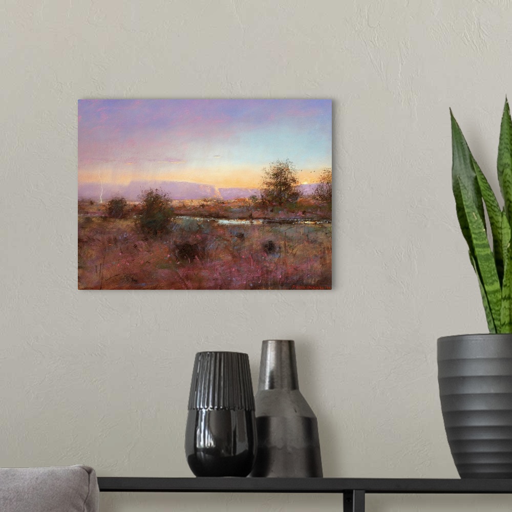 A modern room featuring A contemporary painting of a southwestern landscape under a purple sky.