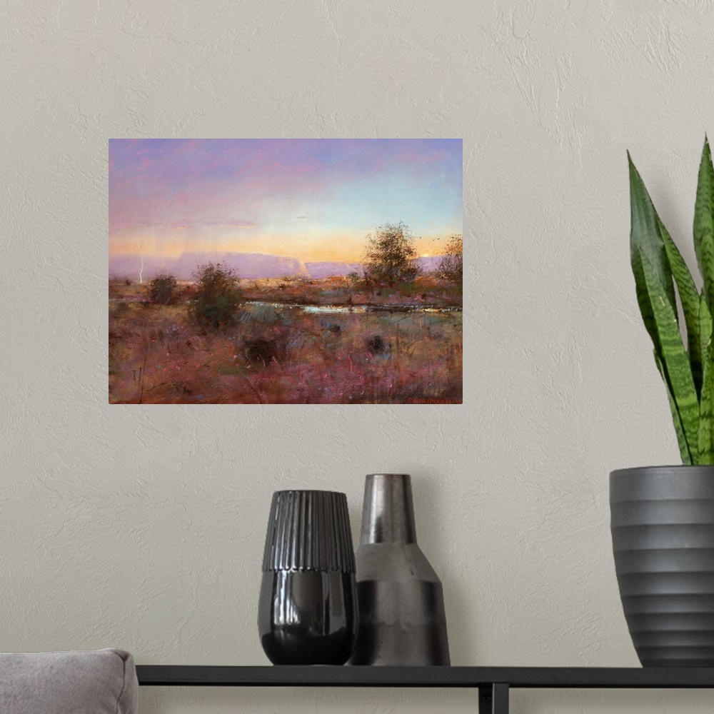A modern room featuring A contemporary painting of a southwestern landscape under a purple sky.