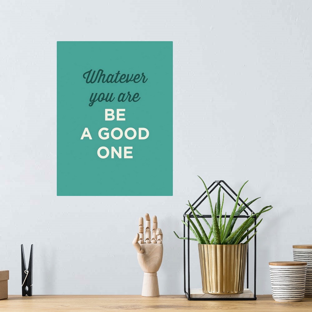 A bohemian room featuring "Whatever You Are Be A Good One" on a teal background.