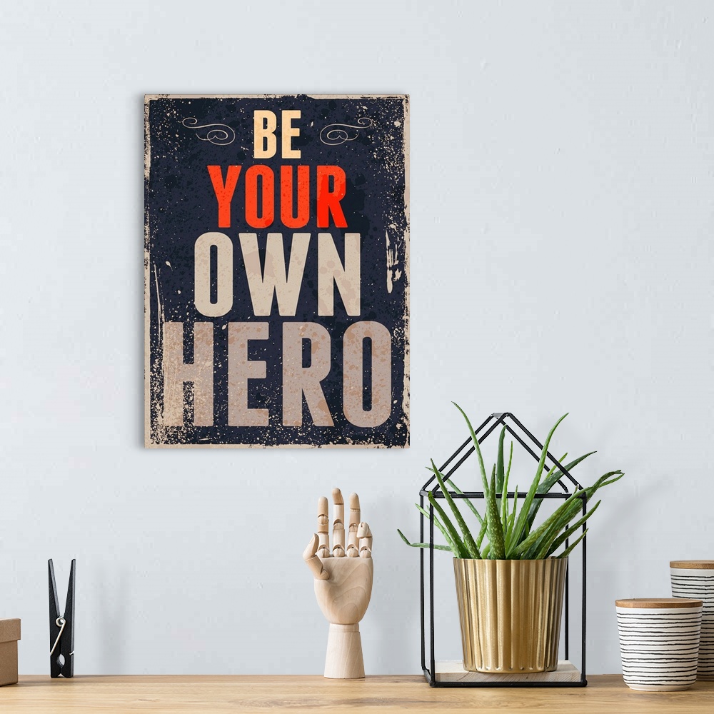 A bohemian room featuring "Be Your Own Hero" in a distressed style.