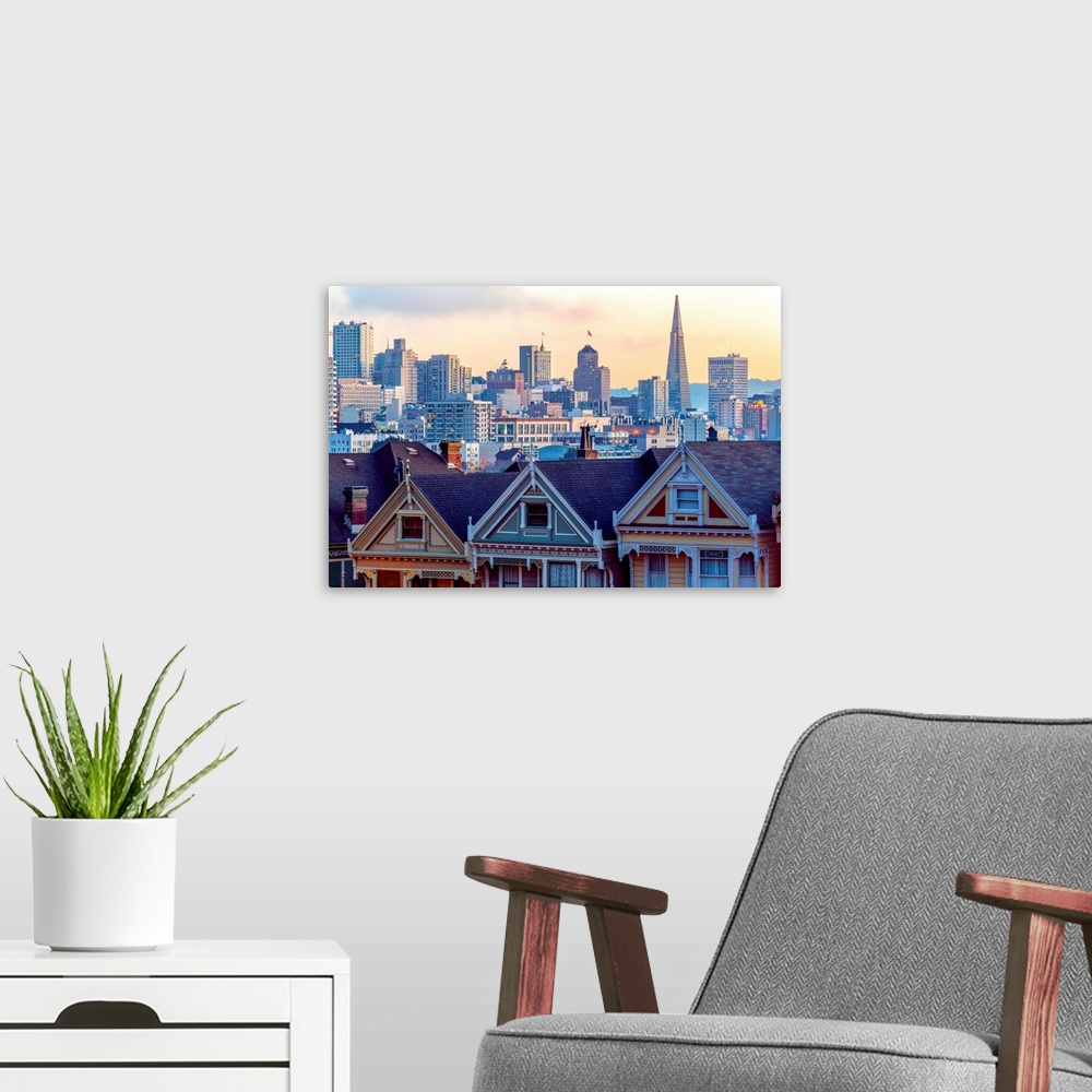 A modern room featuring Photography of a pastel-colored row of houses with the San Francisco skyline in the background.