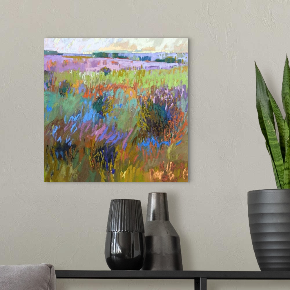 A modern room featuring A square abstract of a field with flowers painted with brush strokes of vibrant colors.