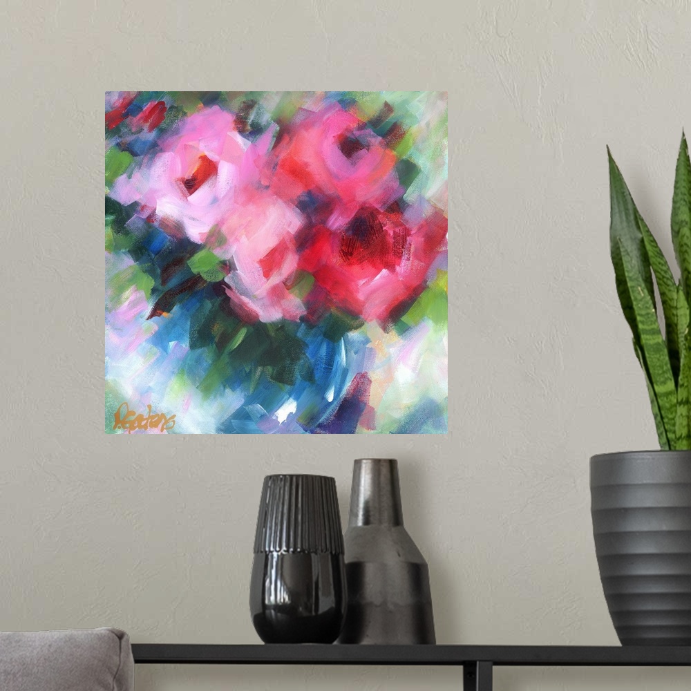 A modern room featuring A square abstract painting of bright pink flowers.
