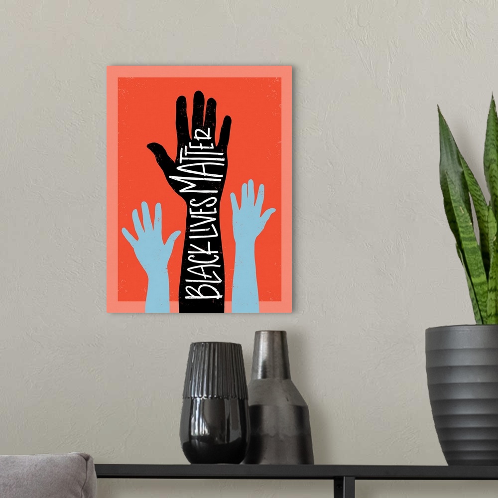 A modern room featuring Black Lives Matter - Hands