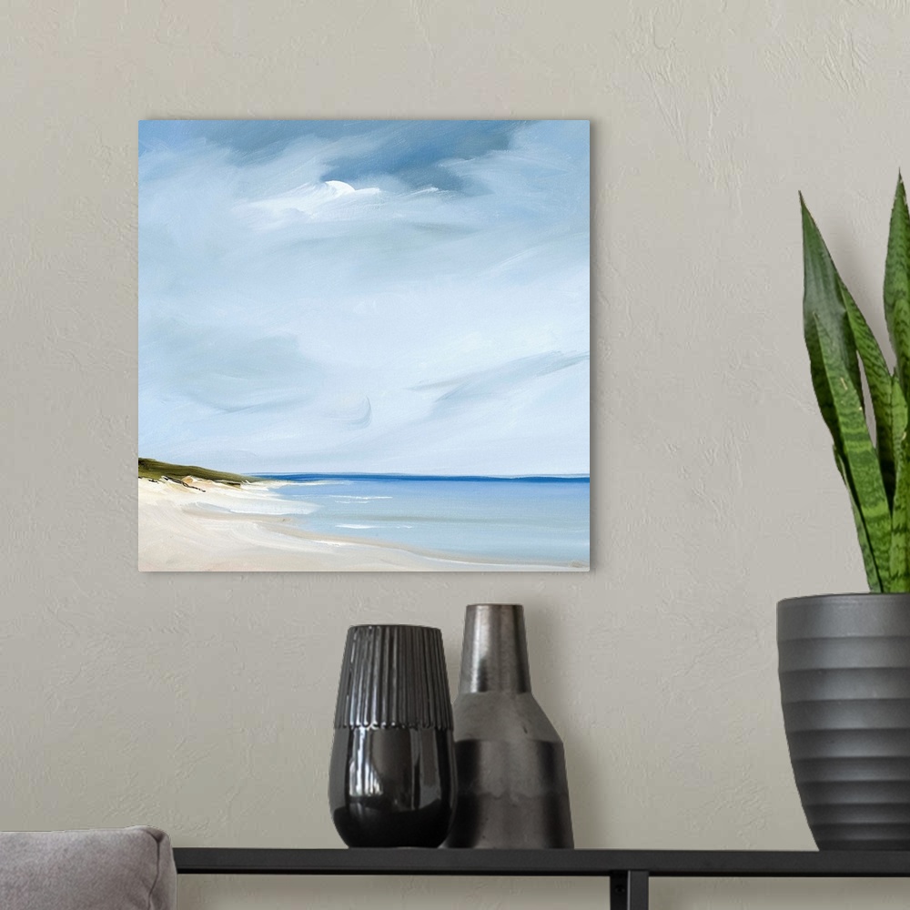 A modern room featuring A contemporary painting of a calm beach scene.