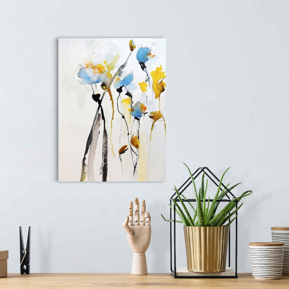 A bohemian room featuring Contemporary watercolor painting of vibrant yellow and blue flowers.