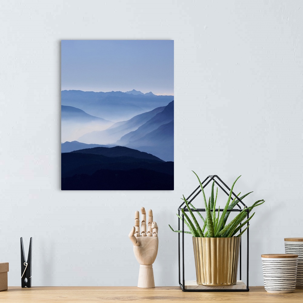 A bohemian room featuring A photograph of clouds along the blue ridge mountains.