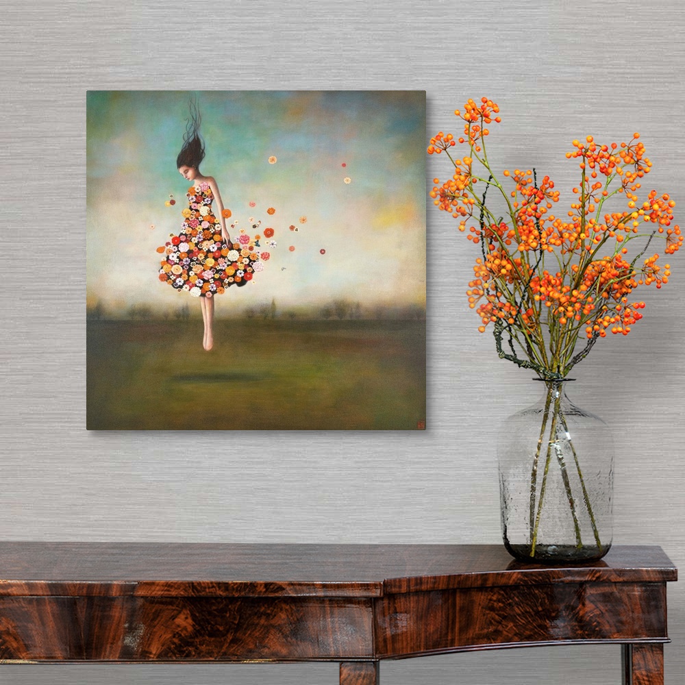 A traditional room featuring Contemporary surreal artwork of a woman wearing a dress made of flowers floating in the air.
