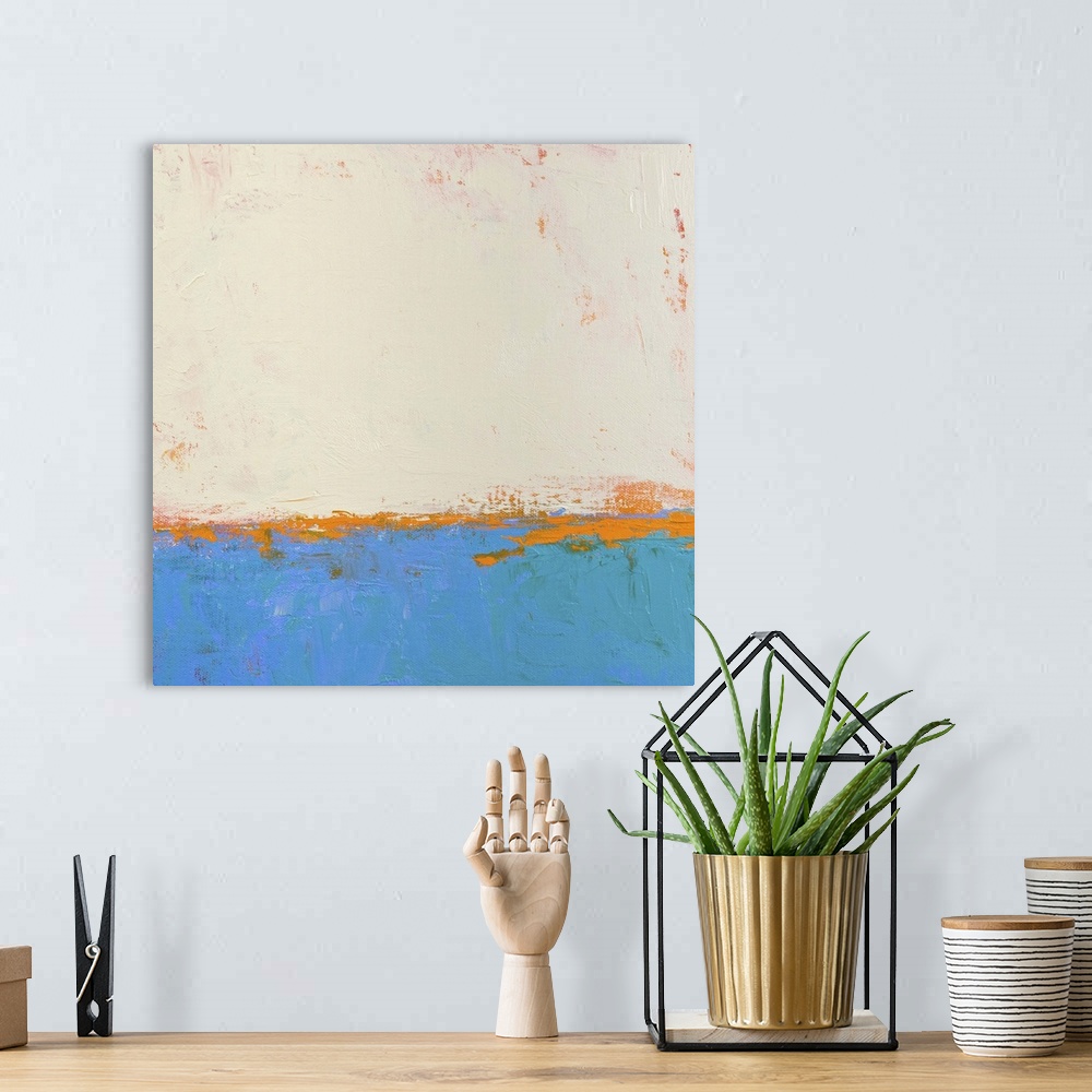 A bohemian room featuring Contemporary abstract colorfield painting using blue orange and cream in a distressed style.