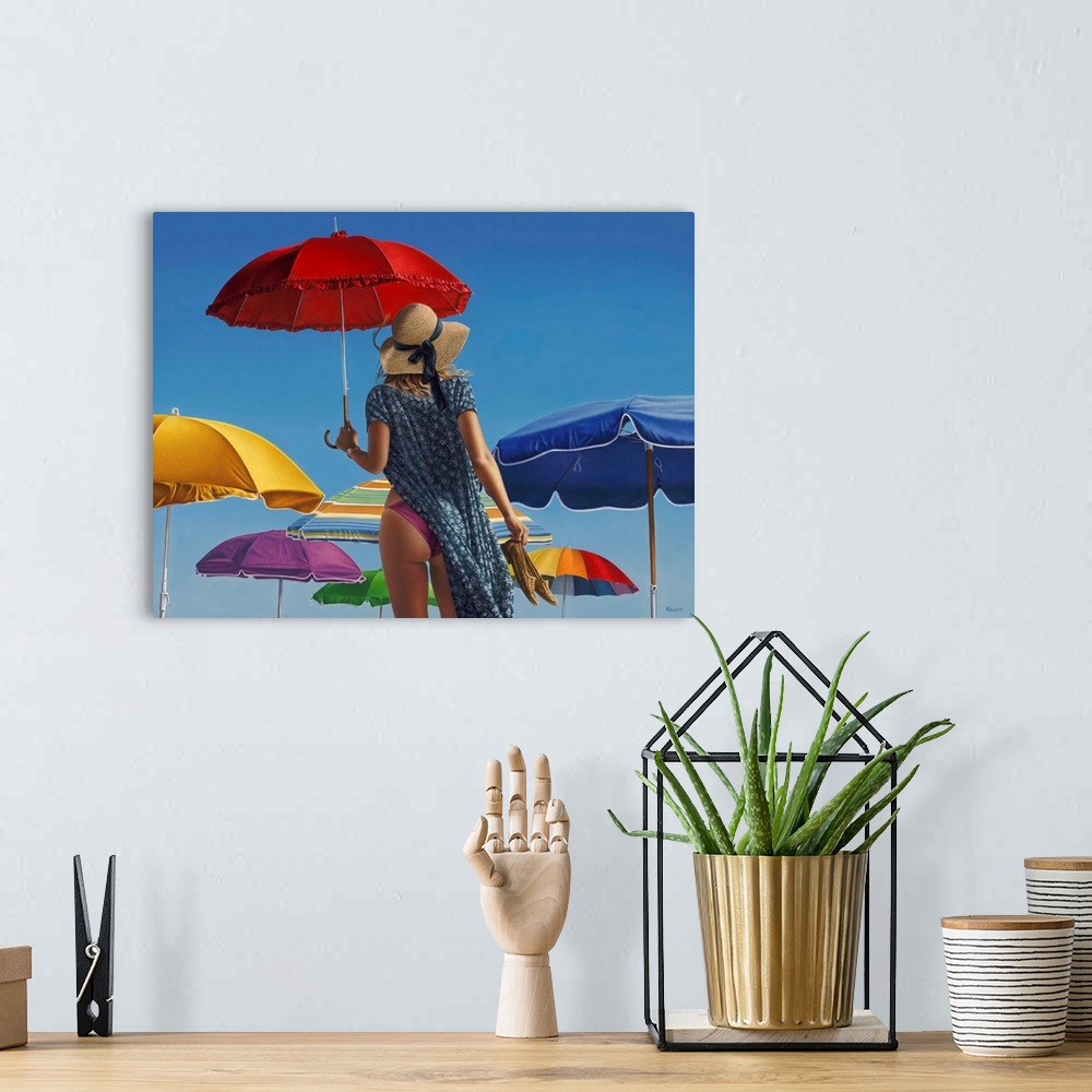 A bohemian room featuring A contemporary painting of a woman standing with beach canopies and holding a red umbrella.