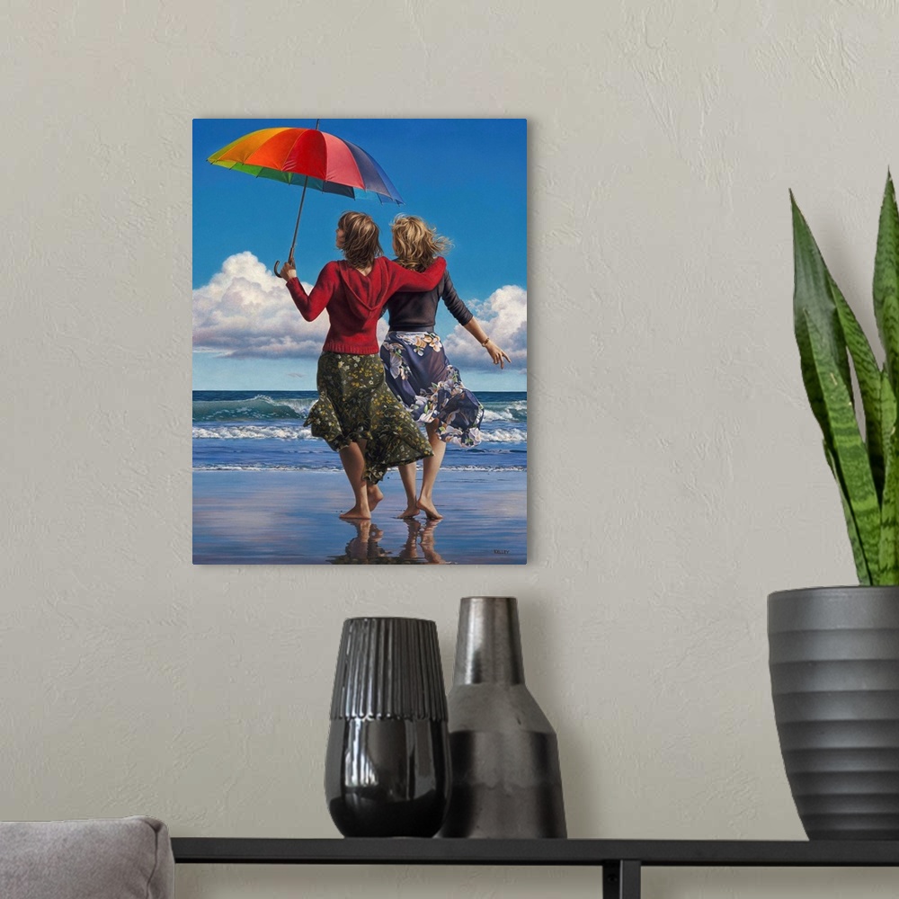 A modern room featuring A contemporary painting of two woman walking along the beach waves while holding an umbrella.