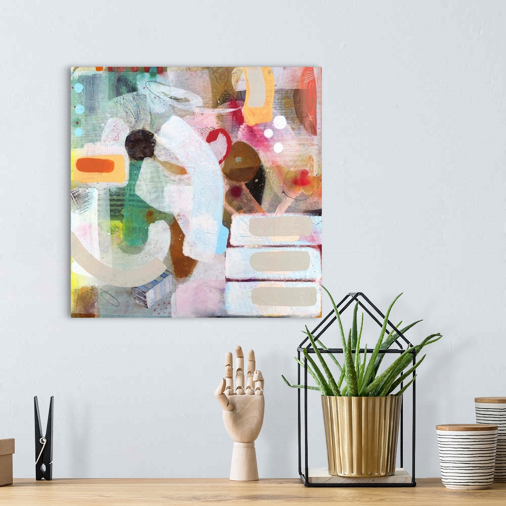 A bohemian room featuring Contemporary abstract painting using vibrant wild colors and shapes.