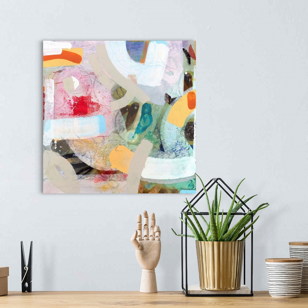 A bohemian room featuring Contemporary abstract painting using vibrant wild colors and shapes.