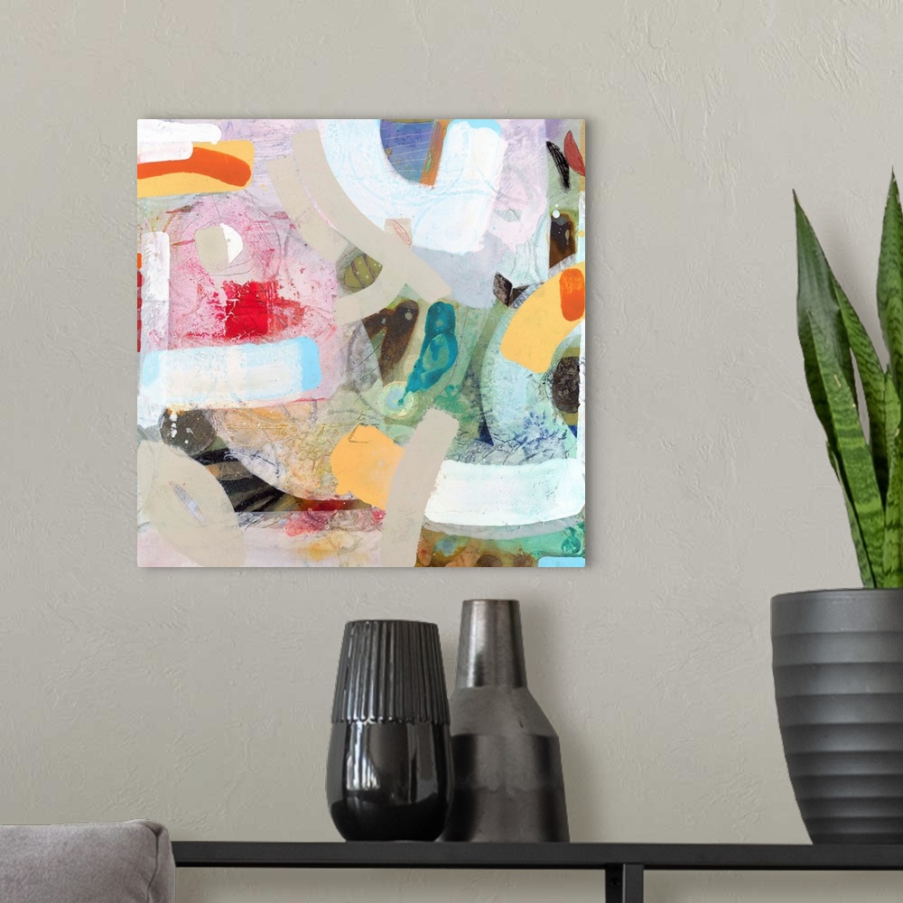 A modern room featuring Contemporary abstract painting using vibrant wild colors and shapes.