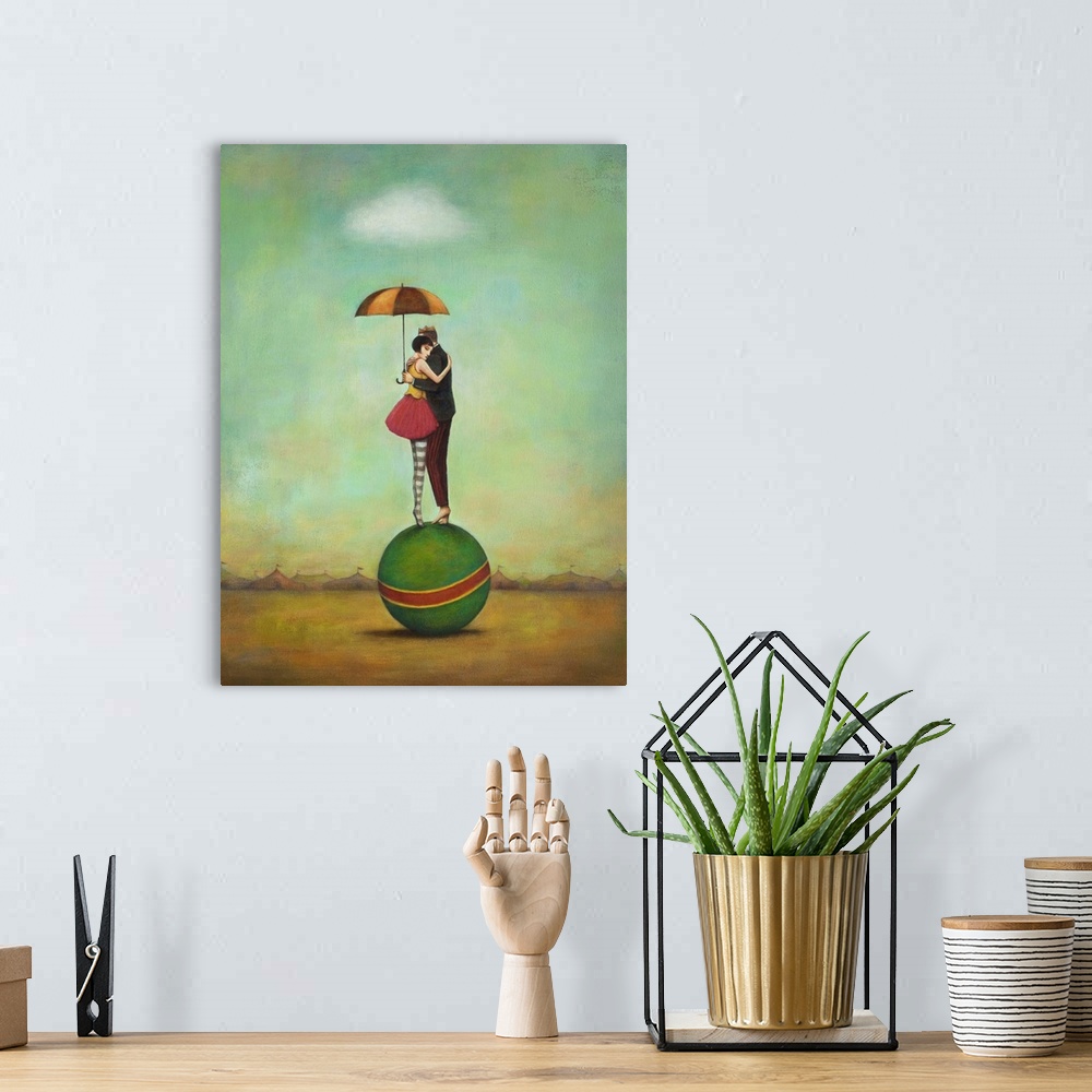 A bohemian room featuring Contemporary surreal artwork of a woman and man embracing on top of a green ball.