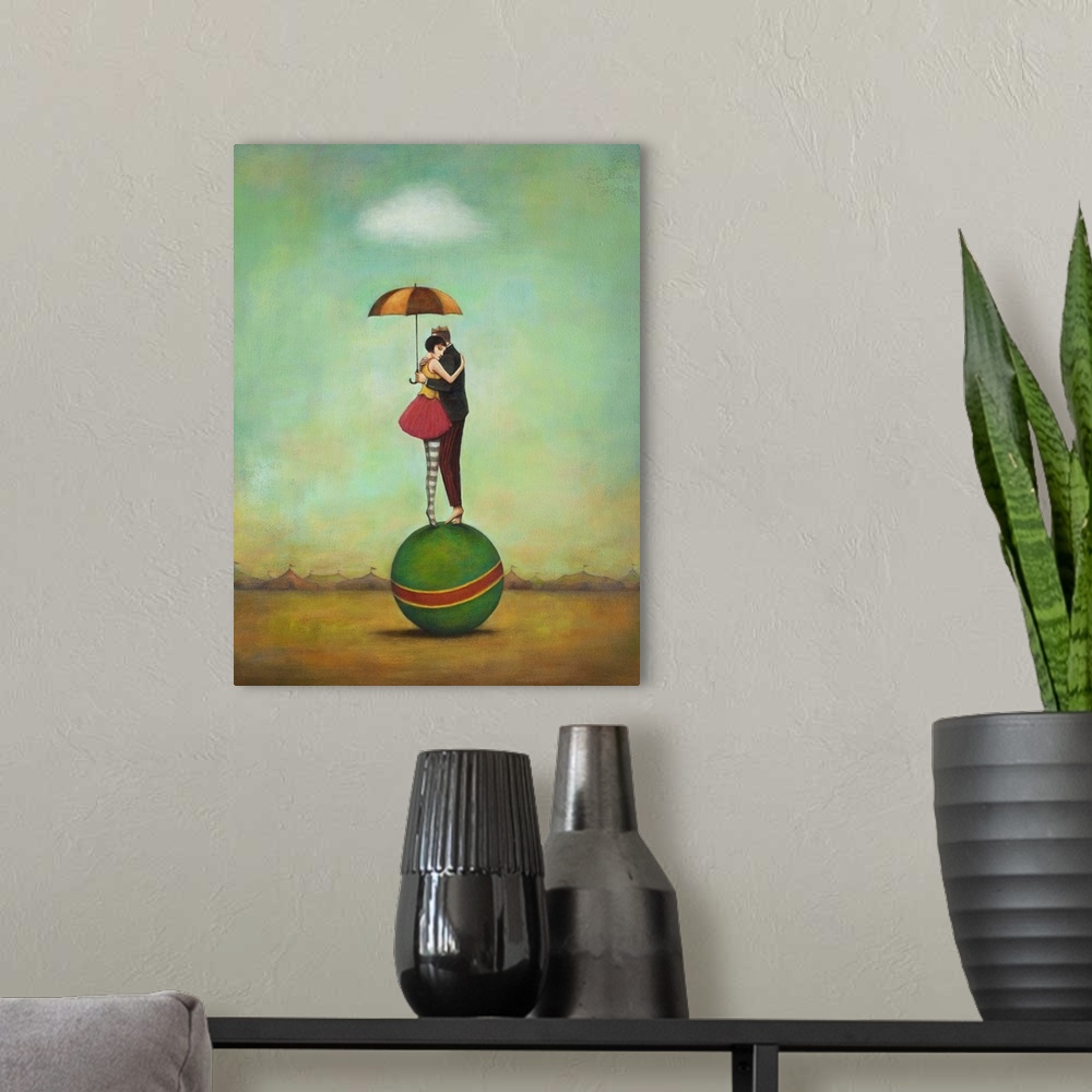 A modern room featuring Contemporary surreal artwork of a woman and man embracing on top of a green ball.