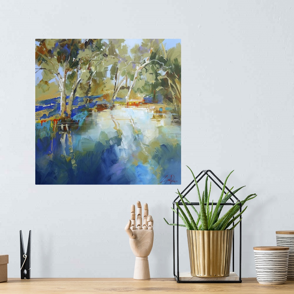 A bohemian room featuring Contemporary painting of trees along a stream.