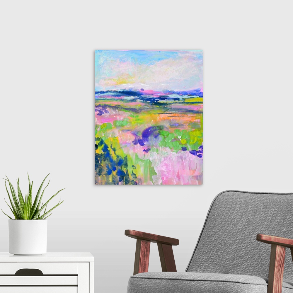 A modern room featuring Brightly colored landscape with a field of vivid green and pink under a pastel blue and pink sky.