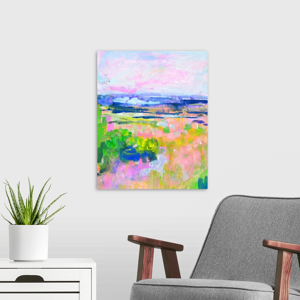 A modern room featuring Brightly colored landscape with a field of vivid green and pink under a pastel blue and pink sky.