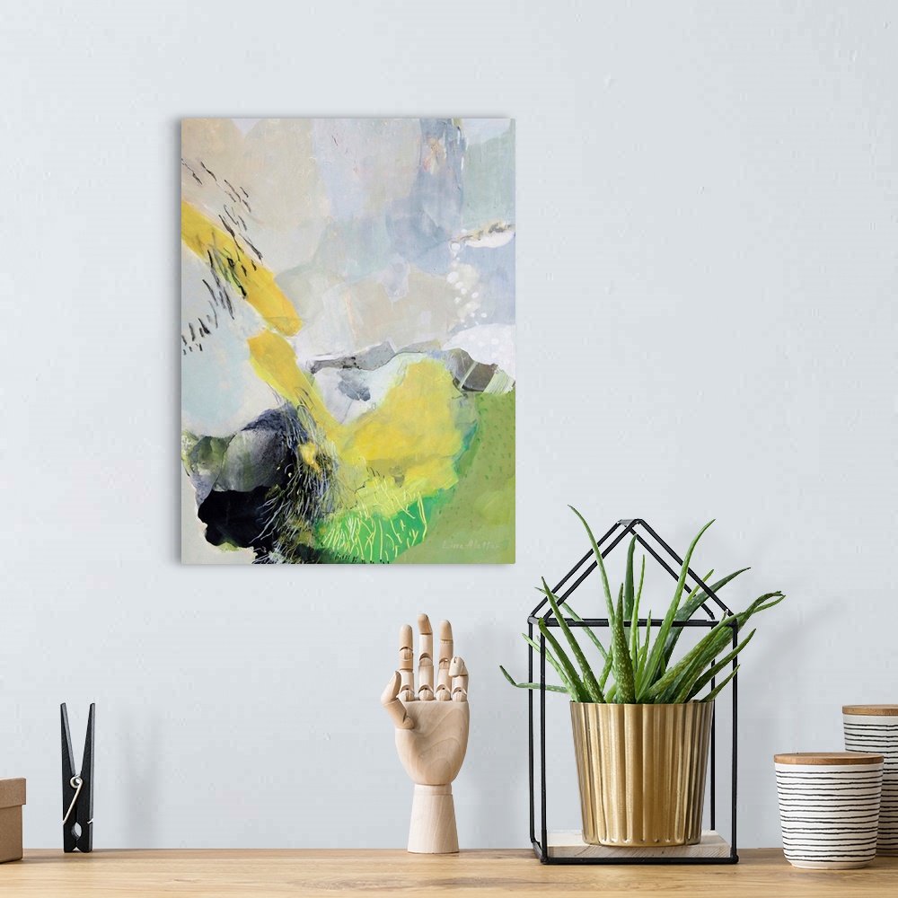 A bohemian room featuring A vertical abstract painting of shapes in yellow and green with lines.