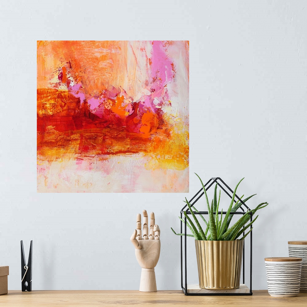 A bohemian room featuring A square abstract painting of textured brush strokes in color tones of yellow, red, orange and pink.