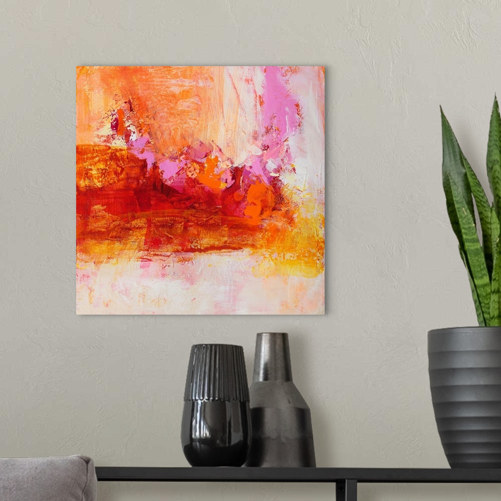 A modern room featuring A square abstract painting of textured brush strokes in color tones of yellow, red, orange and pink.
