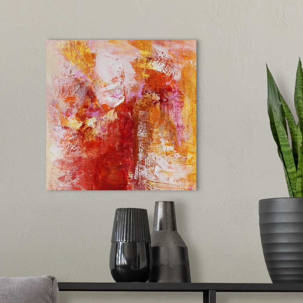 A modern room featuring A square abstract painting of textured brush strokes in color tones of yellow, red, orange and pink.