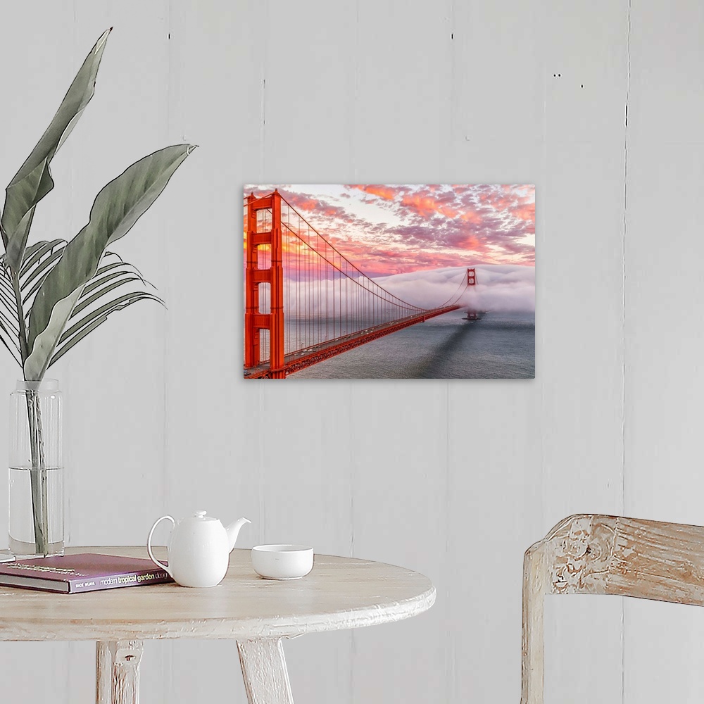 A farmhouse room featuring A dynamic photograph of the golden gate bridge disappearing in a thick blanket of clouds.