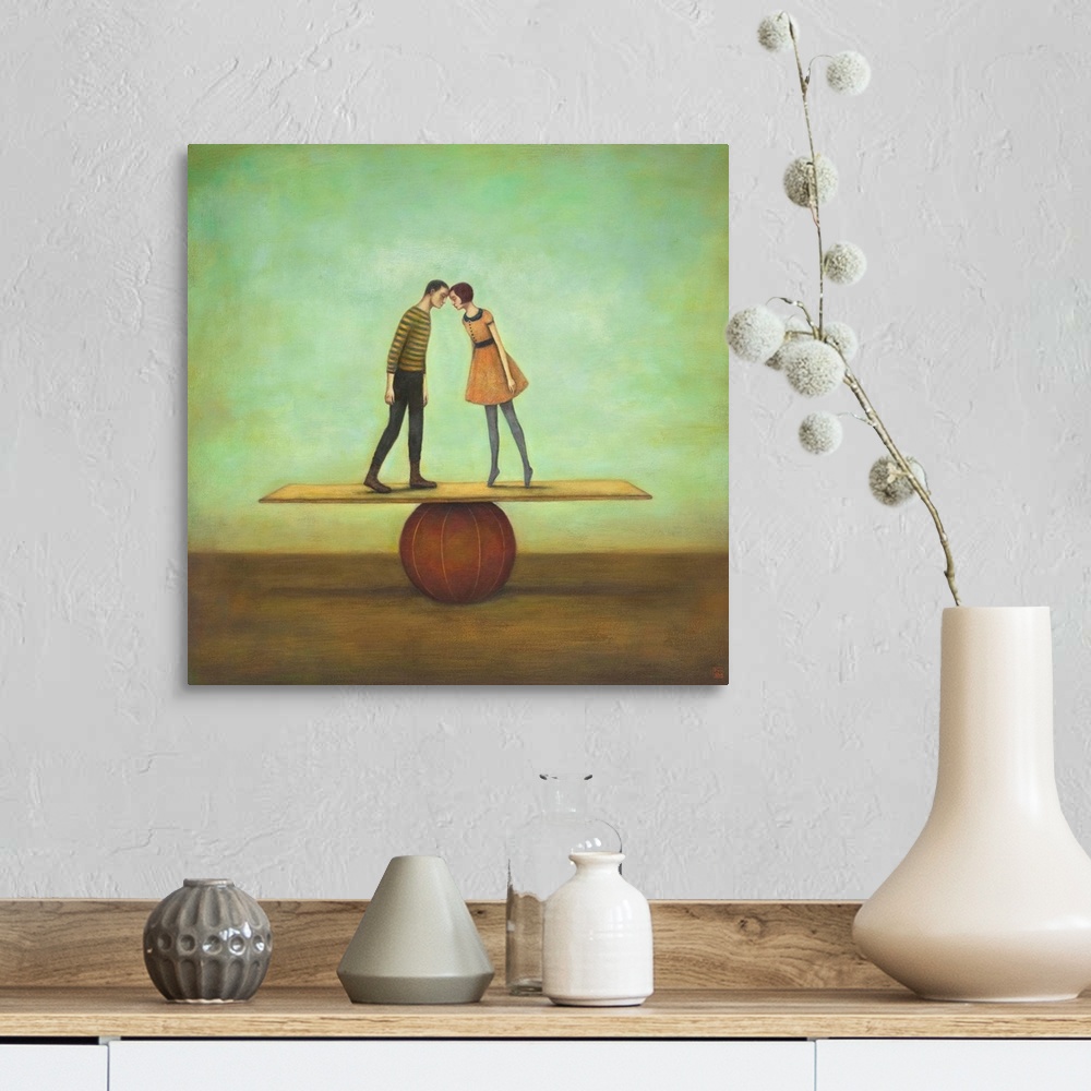 A farmhouse room featuring Contemporary surreal artwork of a woman and man kissing on a plank balancing on a red ball.