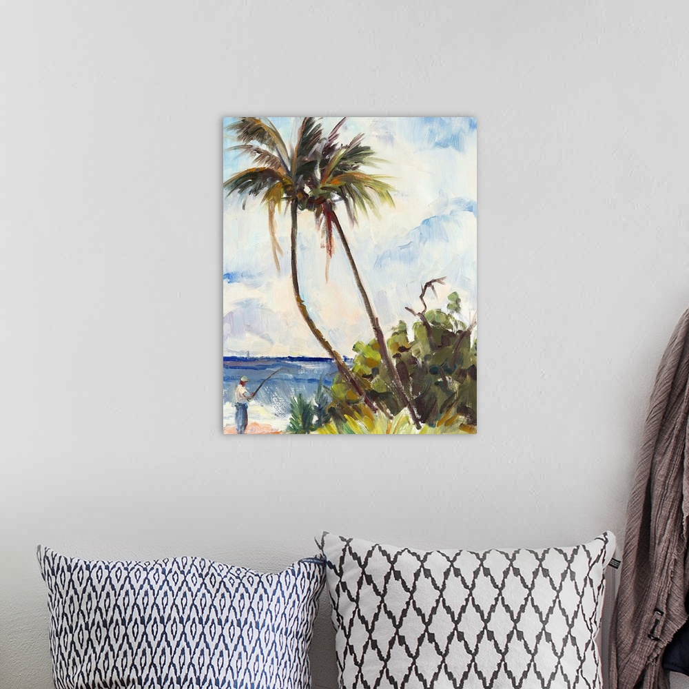 A bohemian room featuring A man fishing on the beach under two tall palm trees.
