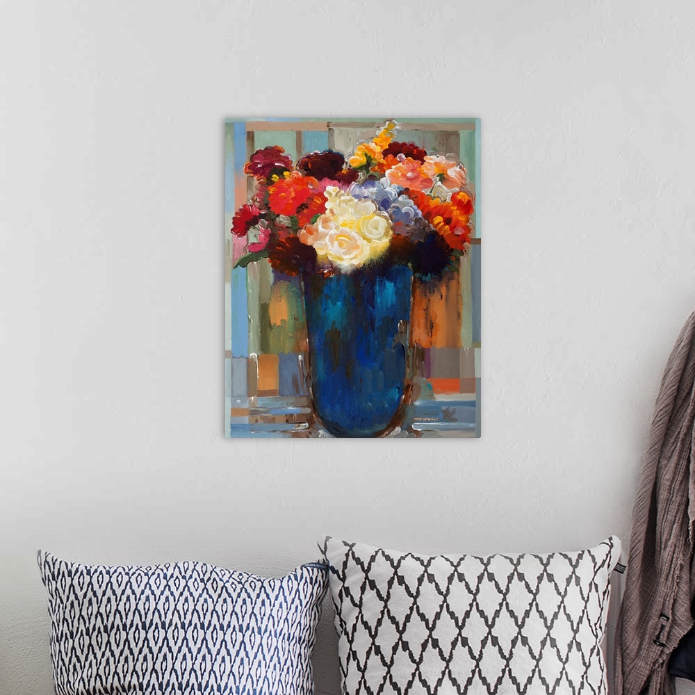 A bohemian room featuring Flowers in a Blue Vase