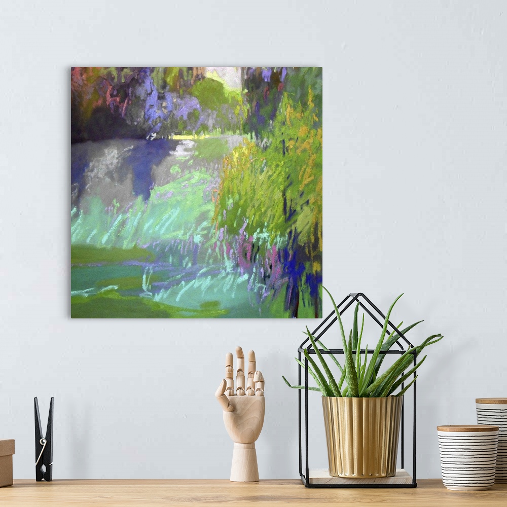 A bohemian room featuring Colorful contemporary landscape painting using vibrant tones of green.