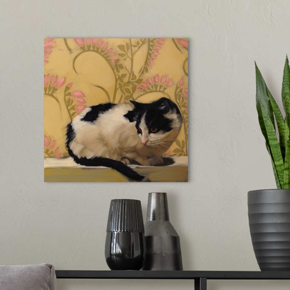 A modern room featuring Contemporary painting of a black and white cat lying near a wall with yellow floral wallpaper.