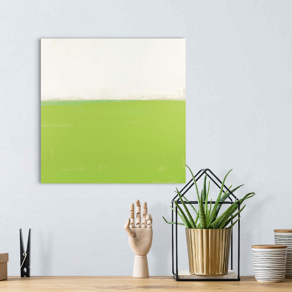 A bohemian room featuring Contemporary abstract colorfield painting using light green and white in a distressed style.