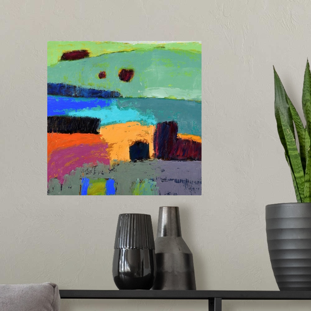 A modern room featuring A square abstract of a landscape of rolling hills painted in vibrant colors.