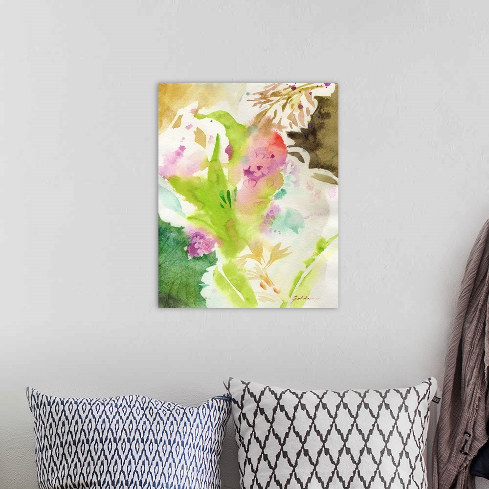 A bohemian room featuring A vertical watercolor painting of abstract leaves.