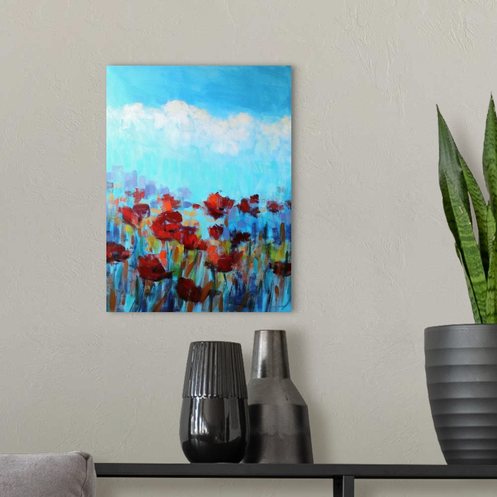 A modern room featuring A colorful contemporary painting of a field of flowers.
