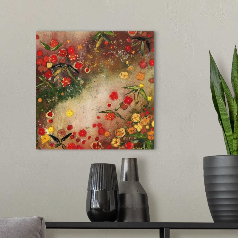 A modern room featuring Contemporary painting of vibrant red flowers mixed with bright yellow flowers.