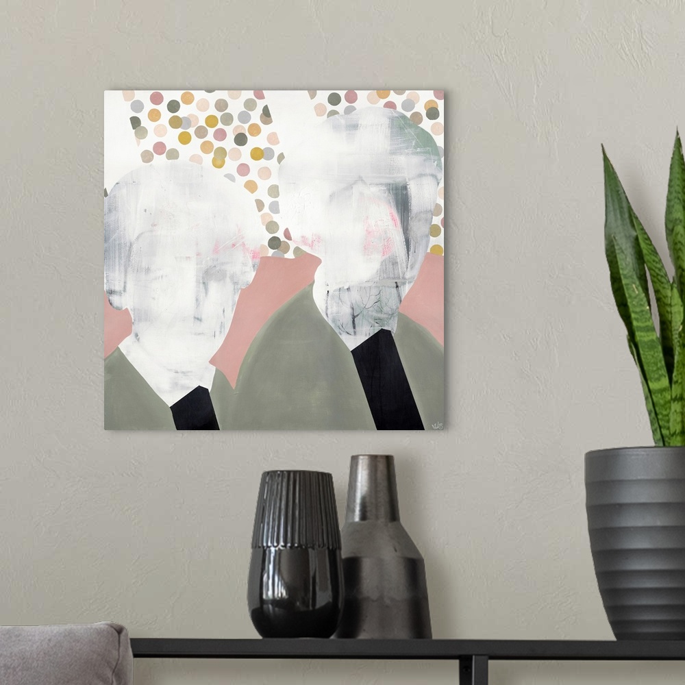 A modern room featuring A square modern contemporary portrait of two people with faded detail in their faces.