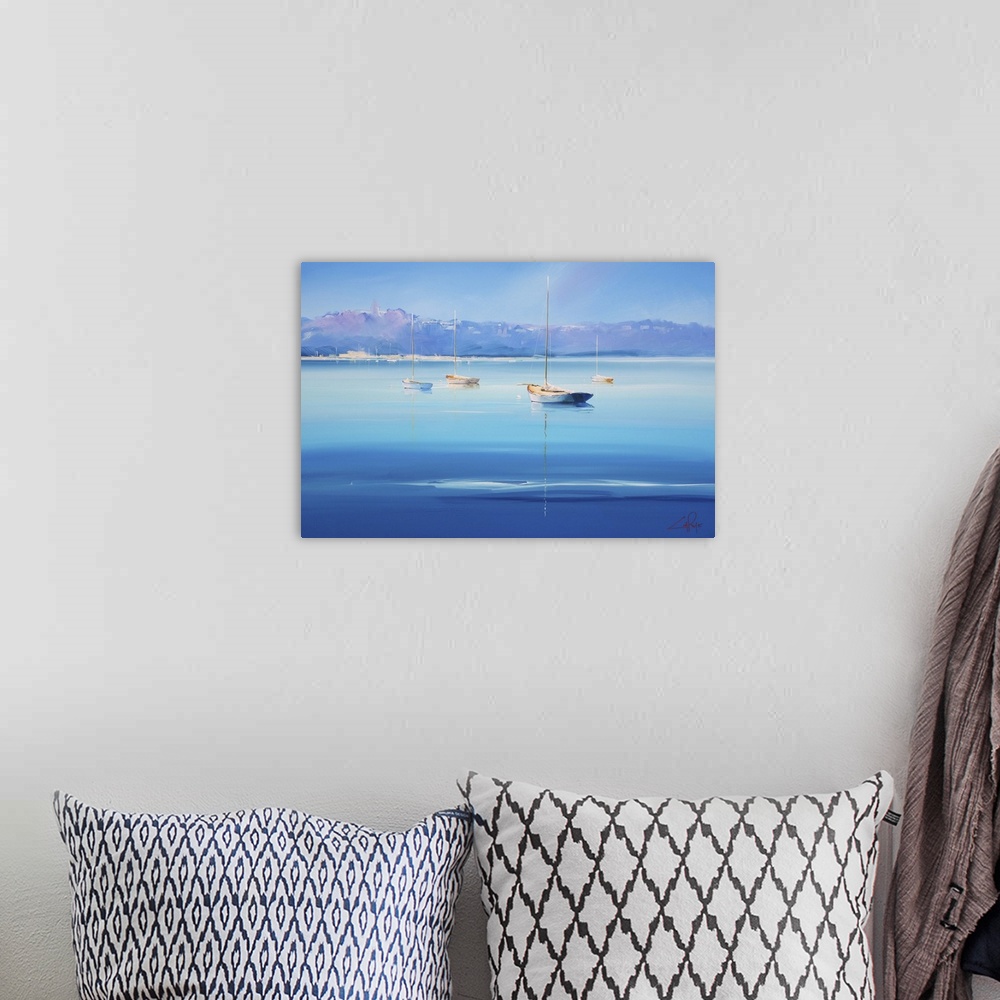 A bohemian room featuring Contemporary artwork of sailboats on deep blue water off the Italian coast.