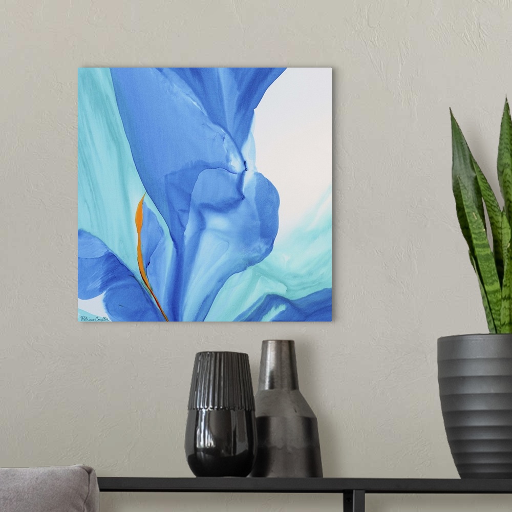A modern room featuring Contemporary abstract painting using tones of blue to make sinuous and smooth strokes of colors.